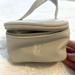 Monogram E cream travel jewelry organizer